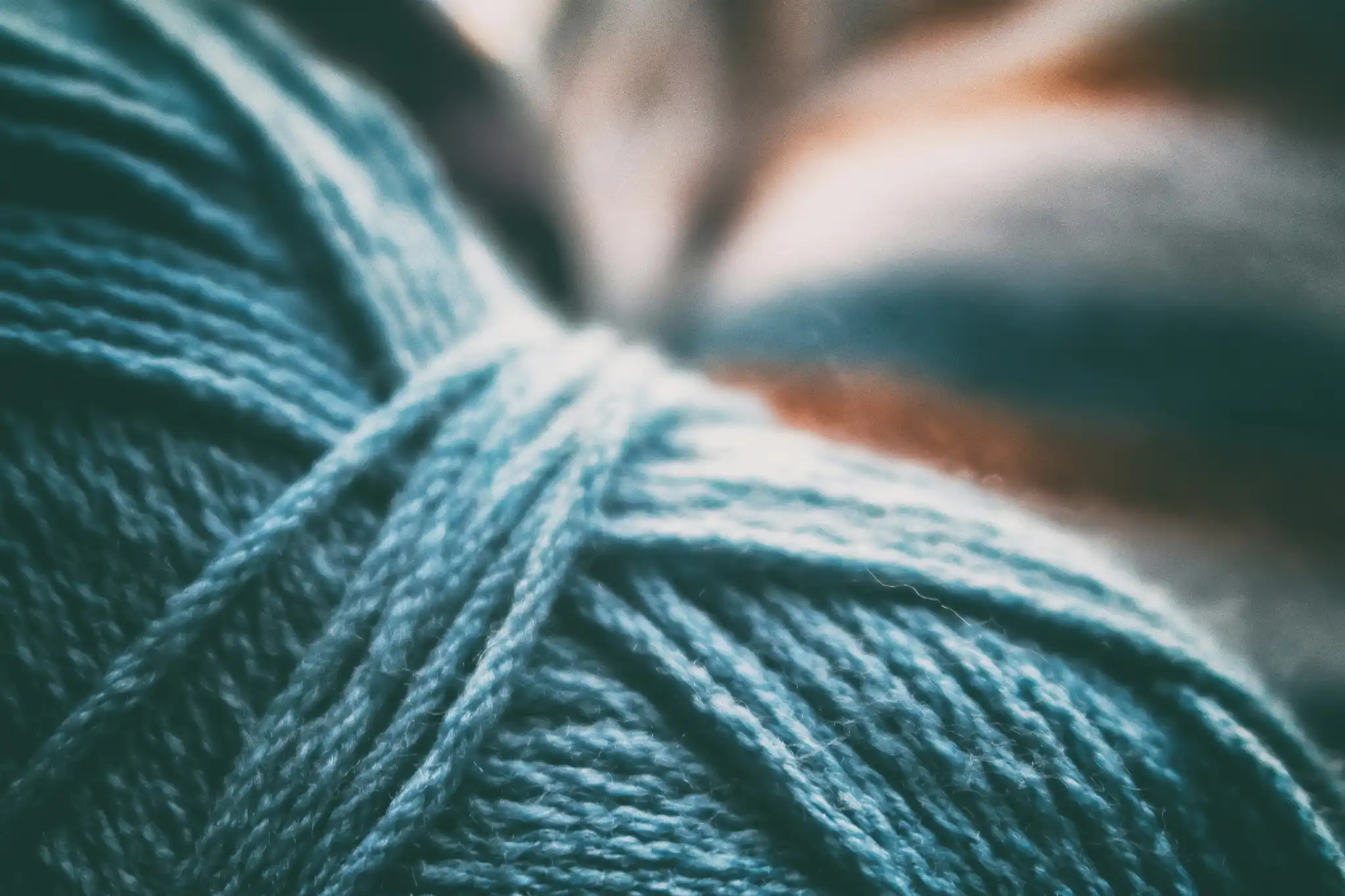 Close-up of a teal skein of yarn